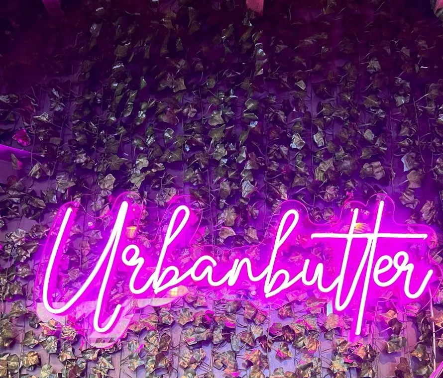 Urbanbutter neon on the ivy wall in the Dartmouth showroom